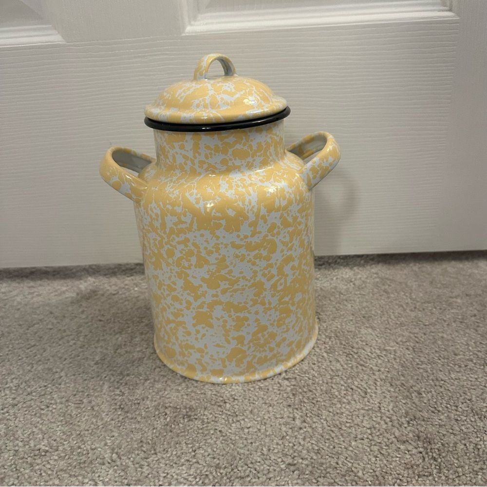 yellow and white enamelware milk can with lid